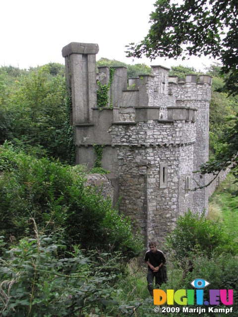 SX08080 Wouko climbing bank at gatehouse of Dunraven Castle